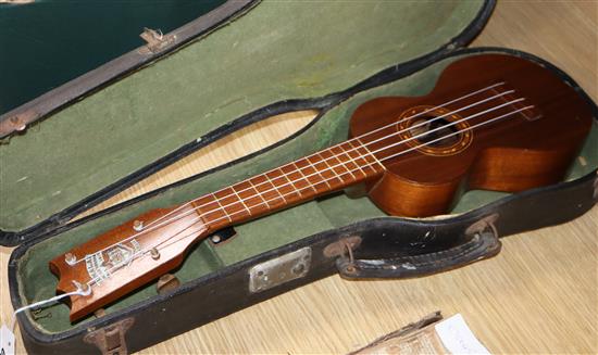 A Hawaii Kumalae Gold Award koa wood ukulele, cased length 22cm